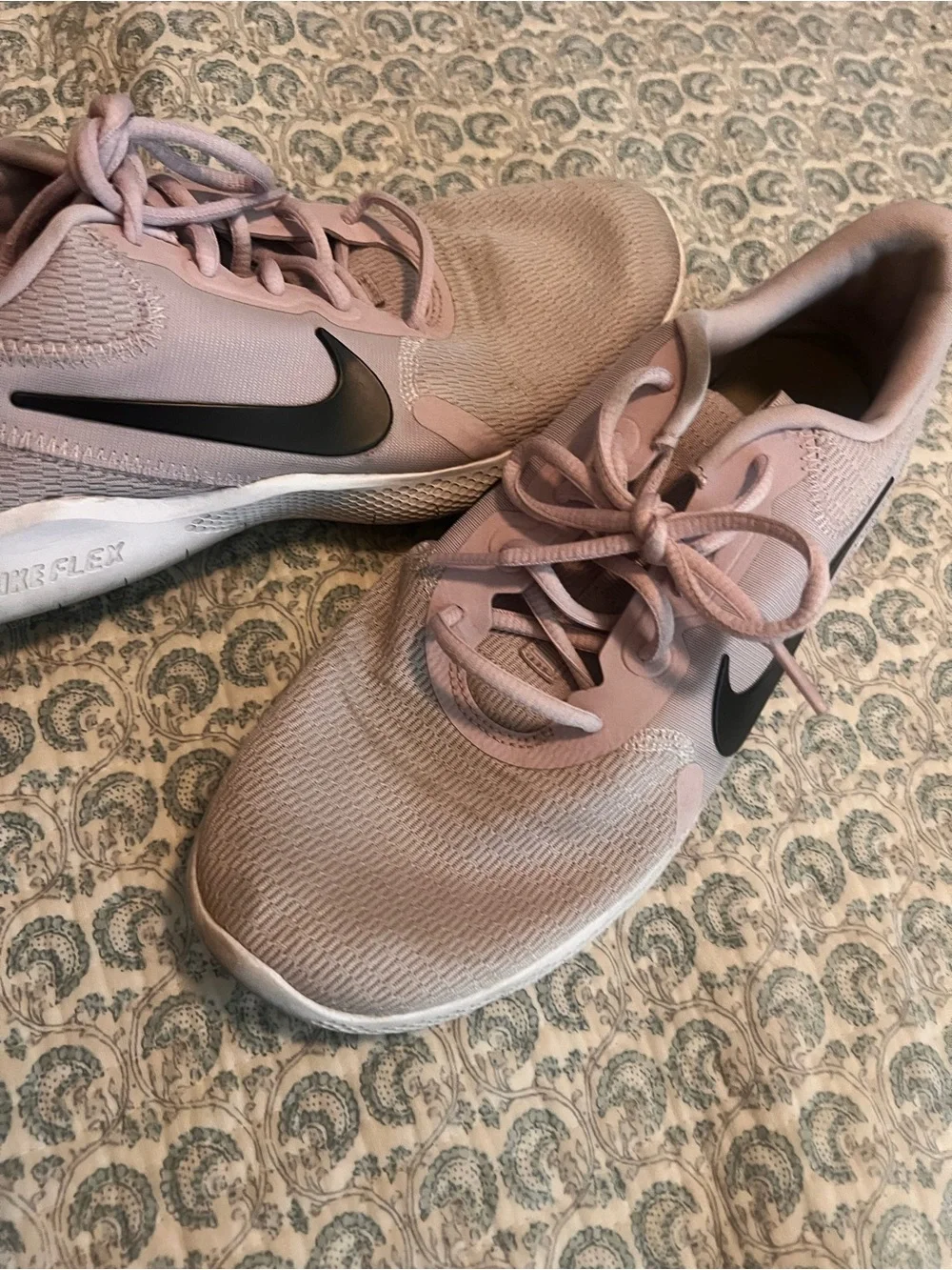 Nike Women's Light Pink Athletic Sneakers with Black Swoosh
